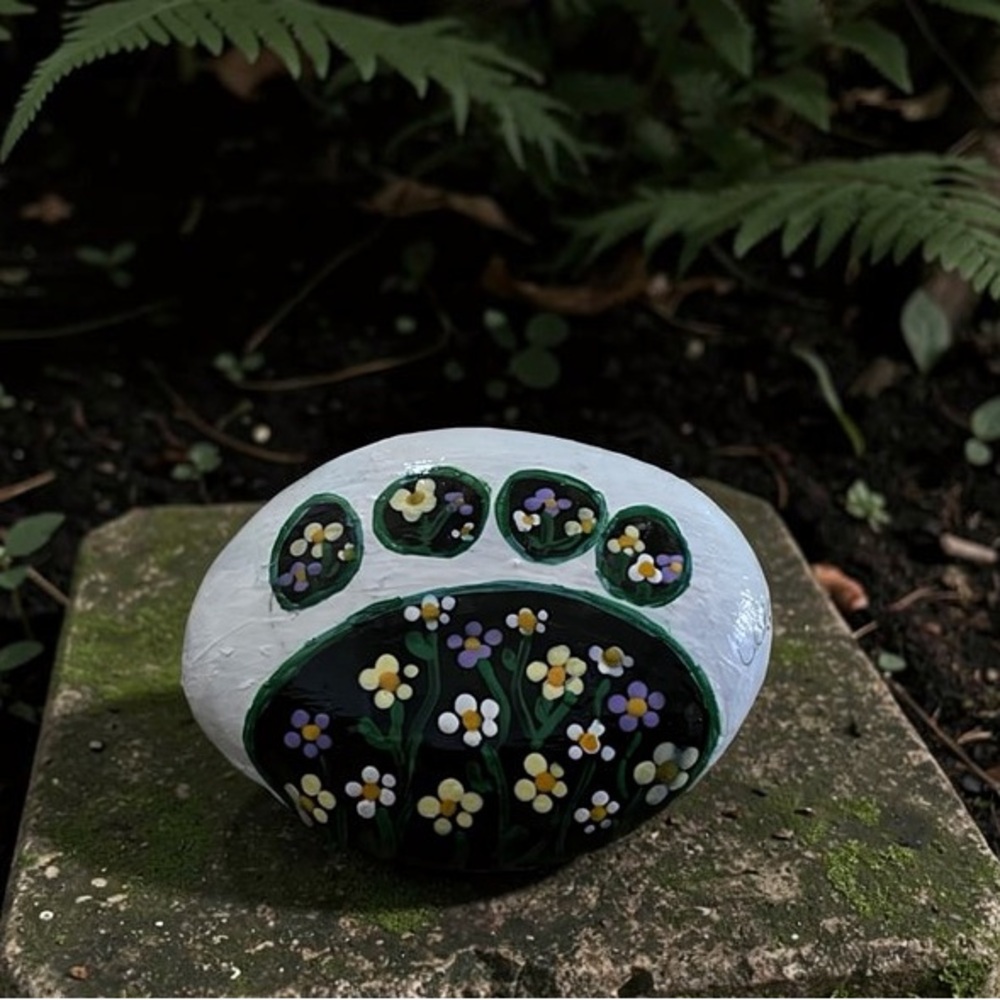 Hand crafted painted floral paw rock white background stone 3x2 inch approx